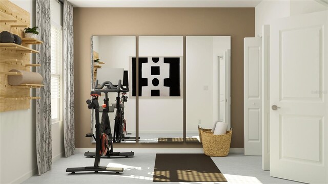 exercise area with baseboards