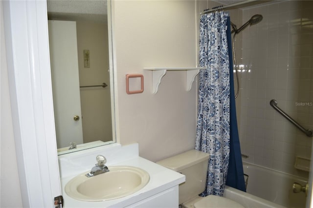 full bathroom with shower / bath combo with shower curtain, toilet, and vanity