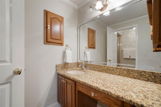 bathroom with vanity and crown molding