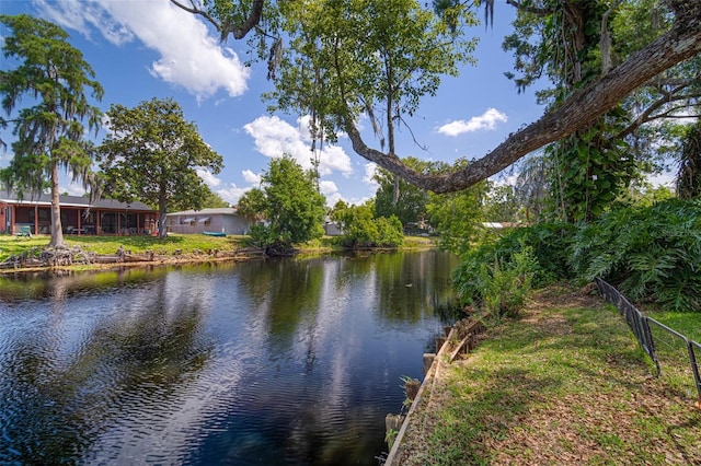 water view featuring fence