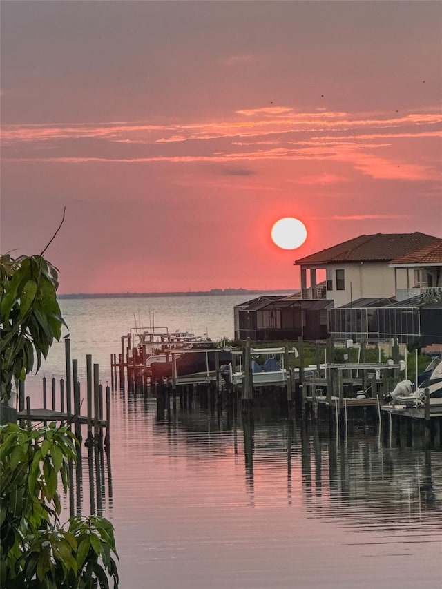 water view featuring boat lift and a boat dock
