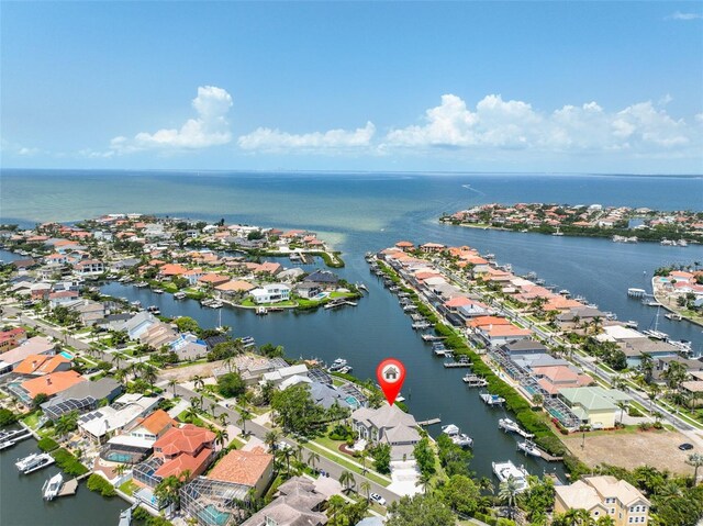 view of property location featuring nearby suburban area and a nearby body of water
