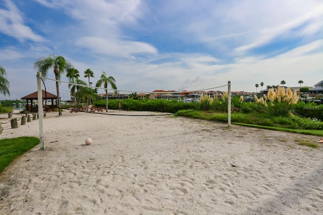 surrounding community featuring volleyball court and a gazebo