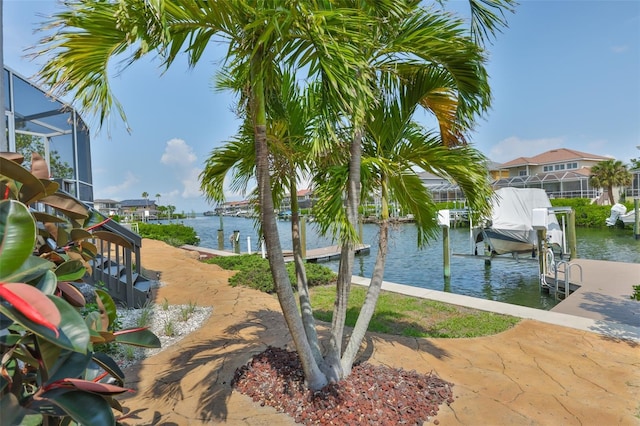 water view with boat lift and a boat dock