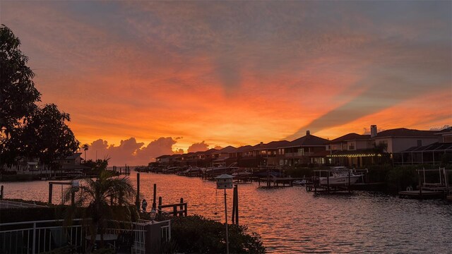 915 Symphony Isles Blvd, Apollo Beach, FL 33572 - water view with a dock and nearby suburban area