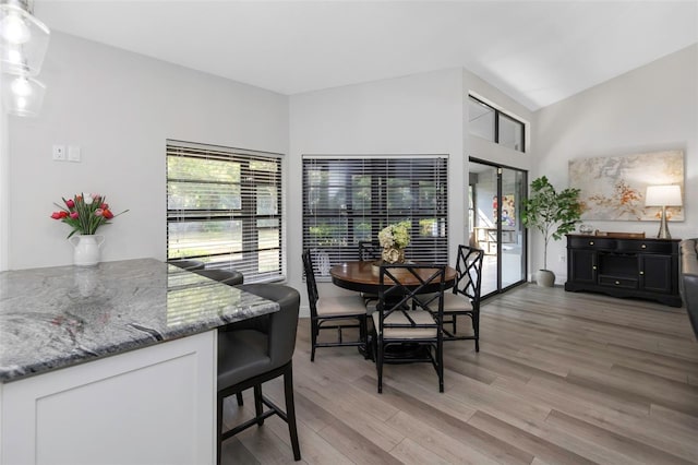 dining space featuring light wood-type flooring