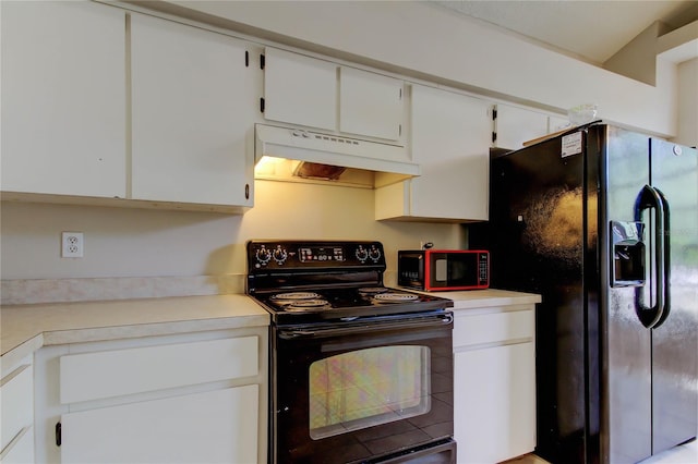 8110 Pond Shadow Ln, Tampa, FL 33635 - kitchen featuring black appliances, under cabinet range hood, and light countertops