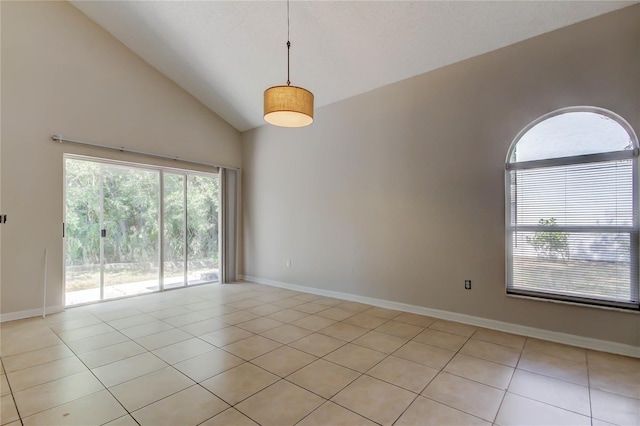 8110 Pond Shadow Ln, Tampa, FL 33635 - unfurnished room featuring healthy amount of natural light, light tile patterned flooring, baseboards, and high vaulted ceiling