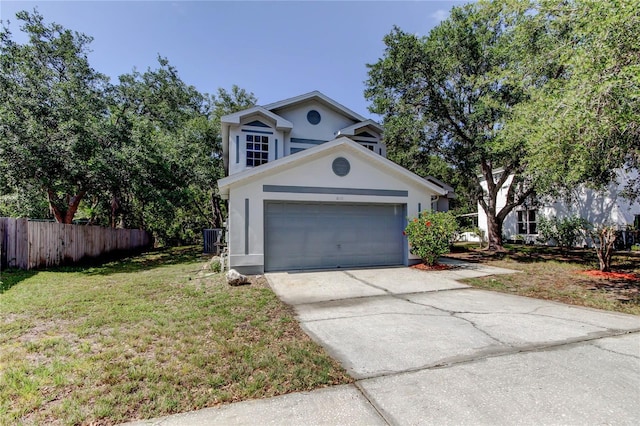 8110 Pond Shadow Ln, Tampa, FL 33635 - view of front of home with stucco siding, concrete driveway, and an attached garage