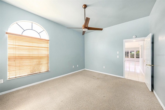 4270 Boston Cir, New Port Richey, FL 34653 - spare room featuring a ceiling fan, carpet floors, and baseboards