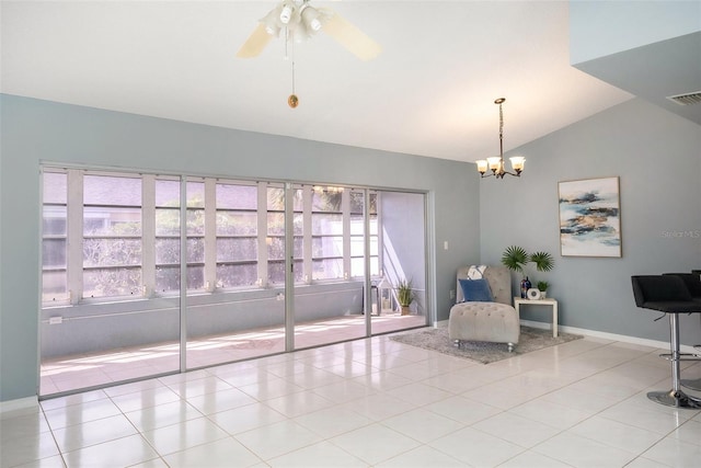 4270 Boston Cir, New Port Richey, FL 34653 - sitting room featuring vaulted ceiling, a chandelier, ceiling fan, tile patterned floors, and baseboards