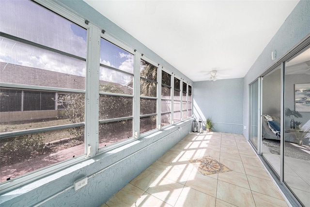 4270 Boston Cir, New Port Richey, FL 34653 - unfurnished sunroom with healthy amount of natural light and a ceiling fan
