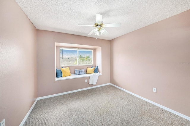4270 Boston Cir, New Port Richey, FL 34653 - carpeted empty room with a ceiling fan, baseboards, and a textured ceiling