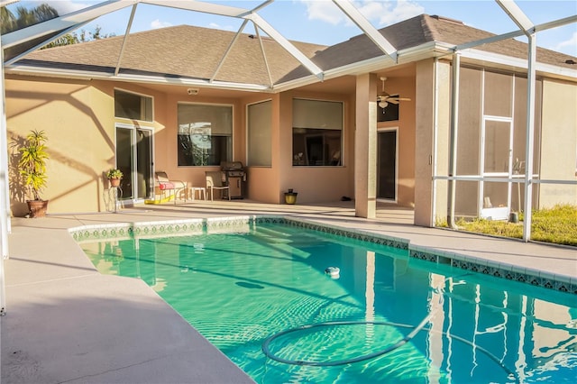 7533 Dunbridge Dr, Odessa, FL 33556 - back of house featuring stucco siding, a patio, and roof with shingles