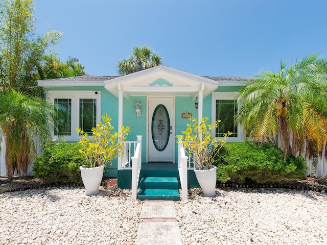 3031 56th St S, Gulfport, FL 33707 - property entrance featuring a porch