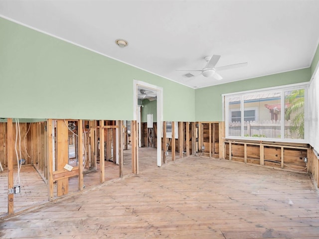 3031 56th St S, Gulfport, FL 33707 - unfurnished room featuring wood-type flooring and a ceiling fan