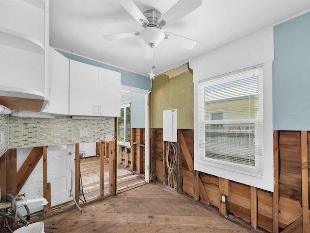 3031 56th St S, Gulfport, FL 33707 - spare room featuring light wood-type flooring and a ceiling fan
