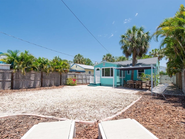 3031 56th St S, Gulfport, FL 33707 - fenced backyard with a patio area