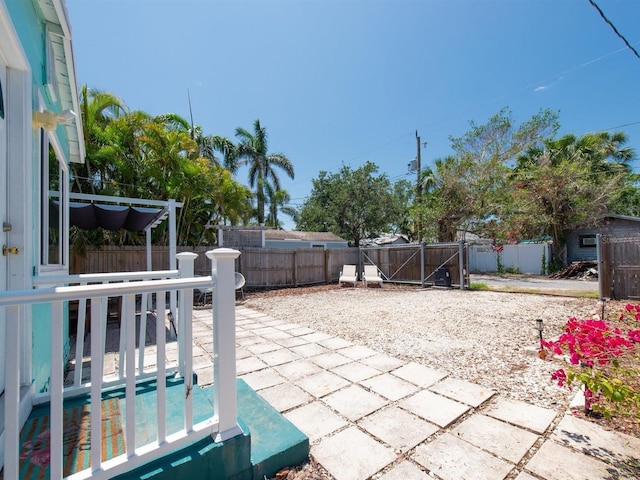 3031 56th St S, Gulfport, FL 33707 - view of patio with a fenced backyard
