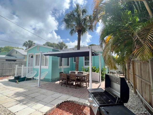 3031 56th St S, Gulfport, FL 33707 - view of patio / terrace with a fenced backyard