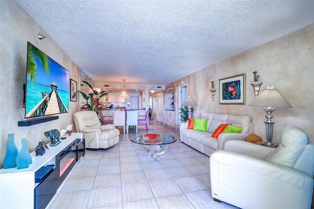 2504 Gulf Blvd Unit 201, Indian Rocks Beach, FL 33785 - living area featuring a textured ceiling