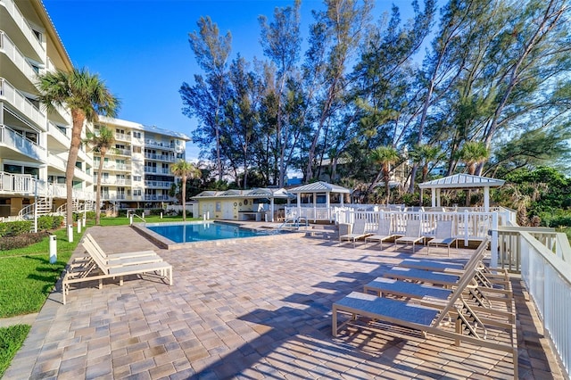 2504 Gulf Blvd Unit 201, Indian Rocks Beach, FL 33785 - community pool featuring a patio