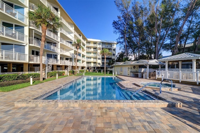 2504 Gulf Blvd Unit 201, Indian Rocks Beach, FL 33785 - community pool featuring a patio and a gazebo