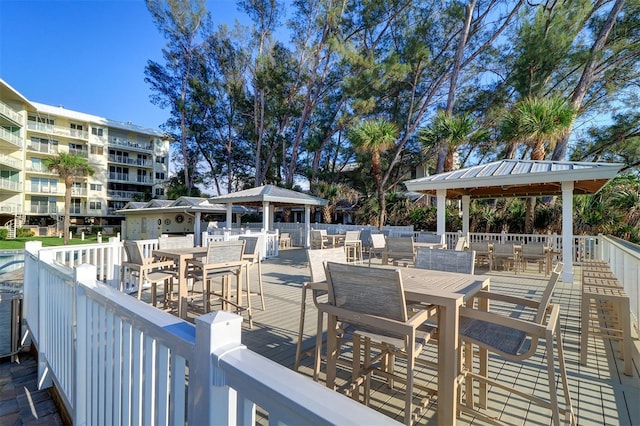 2504 Gulf Blvd Unit 201, Indian Rocks Beach, FL 33785 - view of patio with a gazebo and outdoor dining area