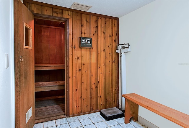 2504 Gulf Blvd Unit 201, Indian Rocks Beach, FL 33785 - relaxing sauna / steam room with tile patterned floors and wooden walls