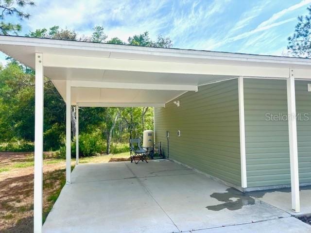 6952 W Barbara Ann Ln, Homosassa, FL 34446 - view of patio featuring an attached carport