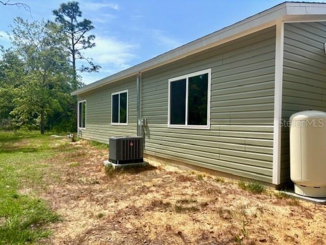 6952 W Barbara Ann Ln, Homosassa, FL 34446 - view of property exterior featuring central air condition unit