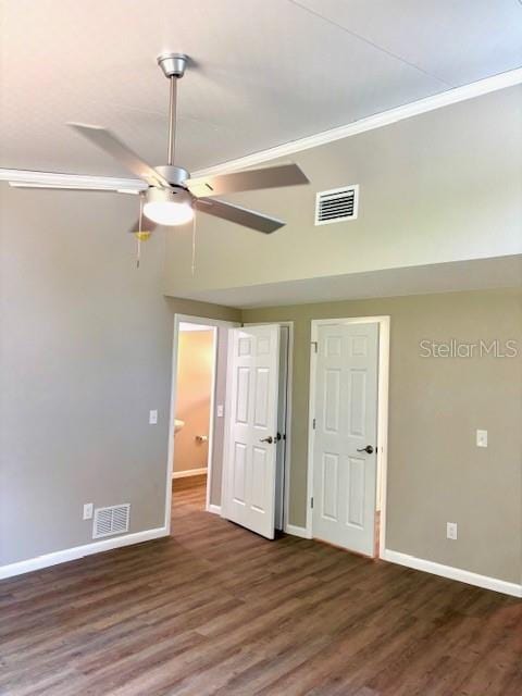 6952 W Barbara Ann Ln, Homosassa, FL 34446 - unfurnished bedroom with baseboards, wood finished floors, ornamental molding, and ceiling fan