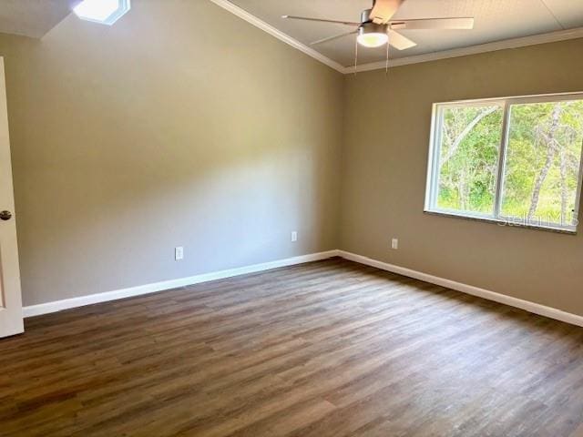 6952 W Barbara Ann Ln, Homosassa, FL 34446 - spare room with ceiling fan, dark wood-type flooring, baseboards, and crown molding