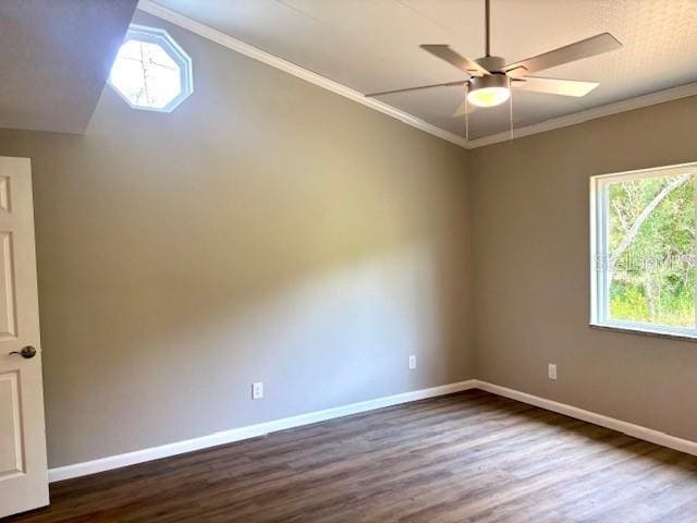 6952 W Barbara Ann Ln, Homosassa, FL 34446 - empty room featuring dark wood-style flooring, ceiling fan, baseboards, and crown molding