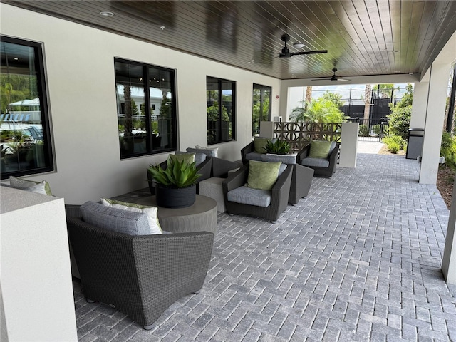 10098 Banyan Breeze Blvd, Land O Lakes, FL 34638 - view of patio / terrace featuring outdoor lounge area and a ceiling fan