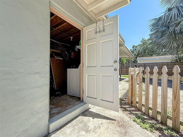 1221 E Hamilton Ave, Tampa, FL 33604 - doorway to property featuring washer / clothes dryer