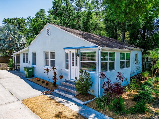 1221 E Hamilton Ave, Tampa, FL 33604 - bungalow with entry steps and stucco siding