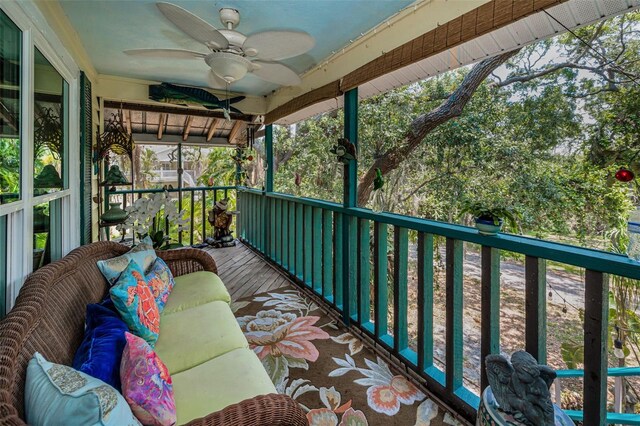 420 Hanby St, Crystal Beach, FL 34681 - balcony with a ceiling fan and an outdoor living space