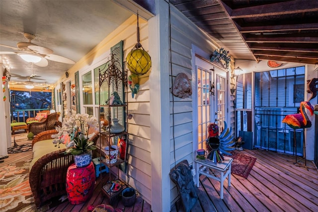 420 Hanby St, Crystal Beach, FL 34681 - wooden terrace featuring a porch, ceiling fan, and french doors