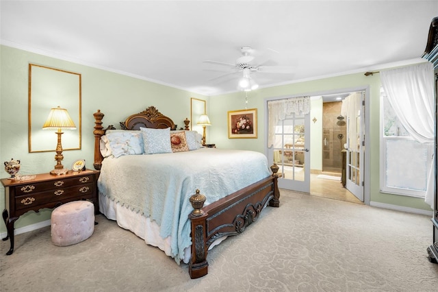 420 Hanby St, Crystal Beach, FL 34681 - carpeted bedroom featuring ornamental molding, baseboards, ensuite bathroom, and ceiling fan