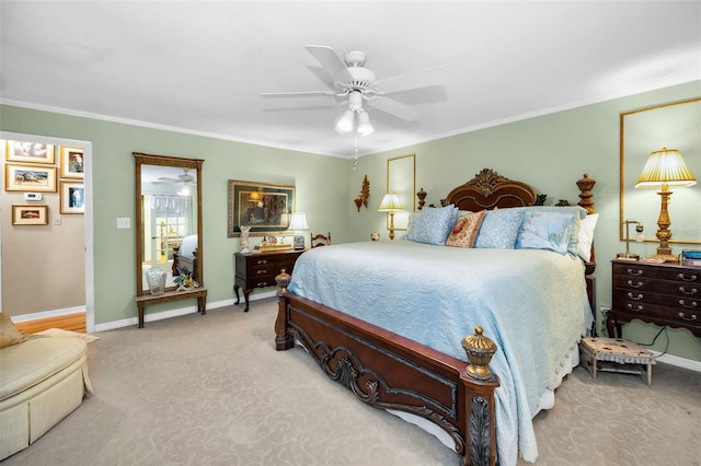 420 Hanby St, Crystal Beach, FL 34681 - bedroom featuring light carpet, baseboards, ornamental molding, and ceiling fan