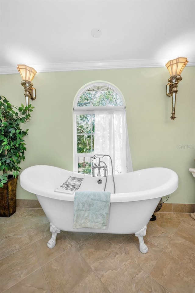 420 Hanby St, Crystal Beach, FL 34681 - full bath featuring crown molding, a freestanding bath, and baseboards