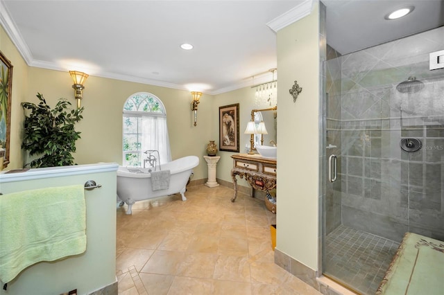 420 Hanby St, Crystal Beach, FL 34681 - bathroom featuring crown molding, a stall shower, a soaking tub, recessed lighting, and baseboards