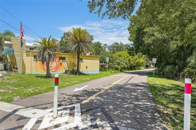 420 Hanby St, Crystal Beach, FL 34681 - view of asphalt street with traffic signs
