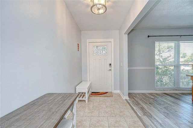 2524 Laurelwood Ln, Valrico, FL 33596 - foyer with baseboards and light tile patterned floors