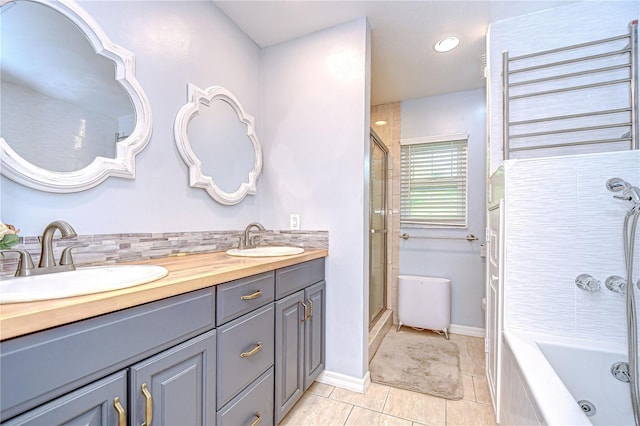 2524 Laurelwood Ln, Valrico, FL 33596 - full bath featuring tile patterned floors, double vanity, recessed lighting, and backsplash