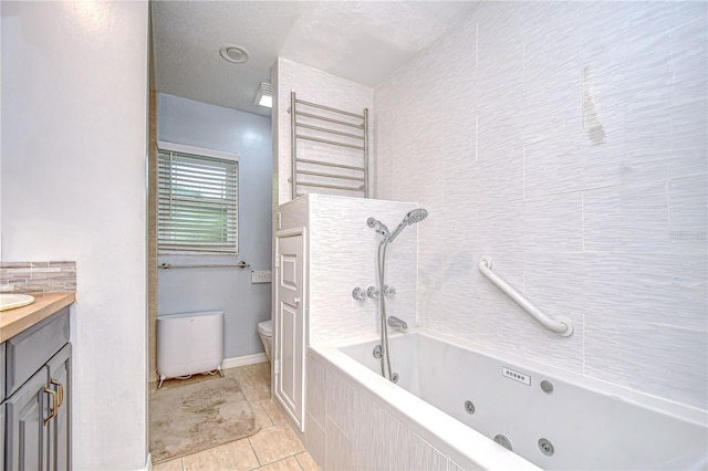 2524 Laurelwood Ln, Valrico, FL 33596 - full bath with toilet, tile patterned flooring, vanity, and baseboards