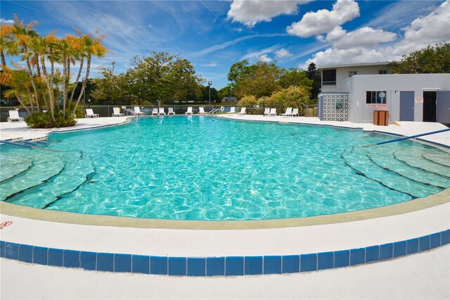 8055 112th St Unit 406, Seminole, FL 33772 - community pool featuring fence