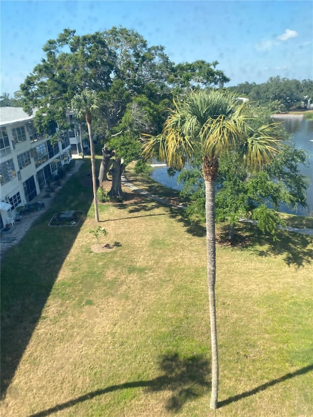 8055 112th St Unit 406, Seminole, FL 33772 - view of green lawn featuring a water view