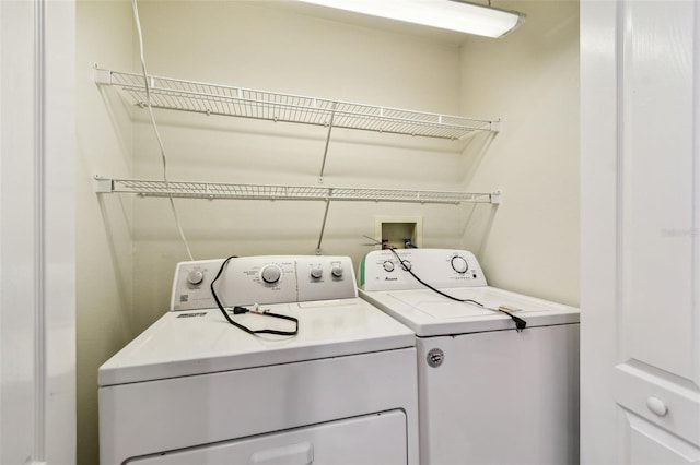 laundry area with washer and clothes dryer